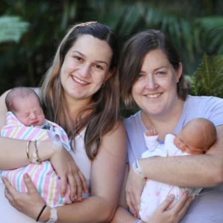 Sisters brave wet weather to give birth days apart