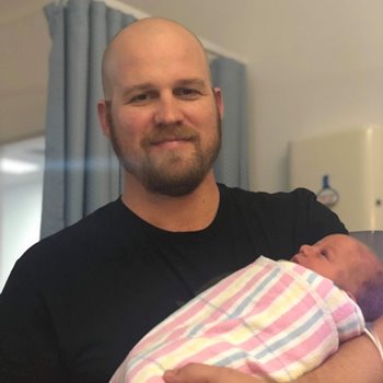 Handy dad Damien welcomes third baby in time for Father’s Day